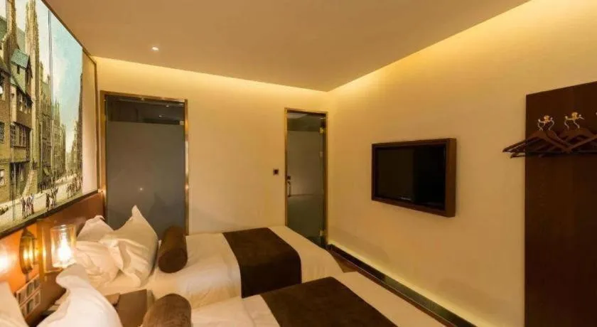 Bed in James Joyce Coffetel Beijing Qianmen Branch