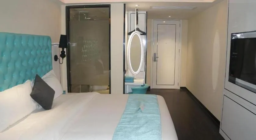 Bed in Xana Lite Hotel Shenzhen Nanshan Xilichaguang Metro Station