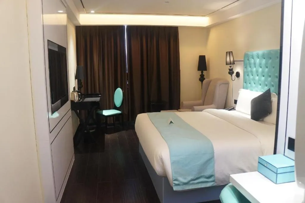 Bed in Xana Lite Hotel Shenzhen Nanshan Xilichaguang Metro Station