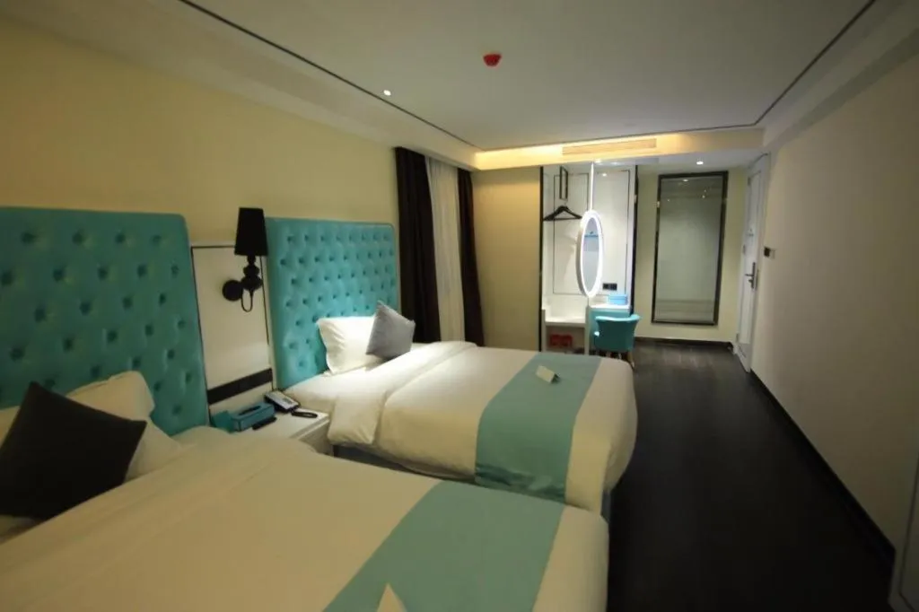 Bed in Xana Lite Hotel Shenzhen Nanshan Xilichaguang Metro Station