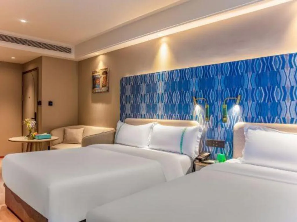 Bed in Xana Hotelle Beijing Olympic Park South Lishuiqiao Metro Station