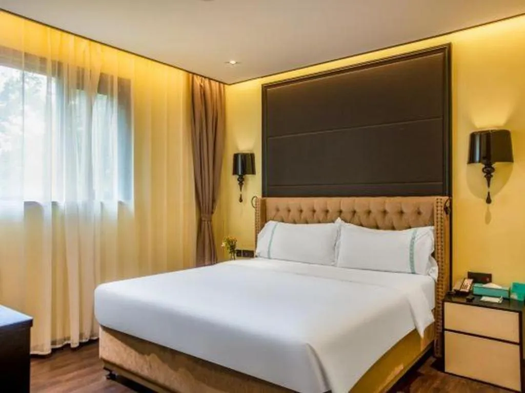 Bed in Xana Hotelle Beijing Olympic Park South Lishuiqiao Metro Station