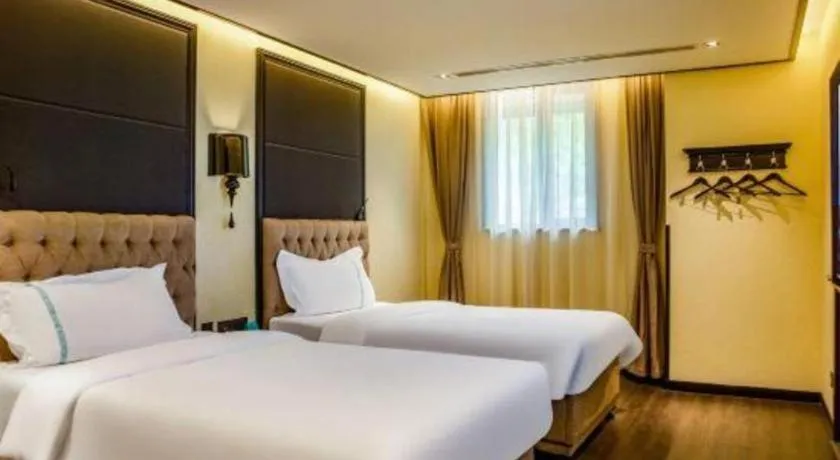 Bed in Xana Hotelle Beijing Olympic Park South Lishuiqiao Metro Station