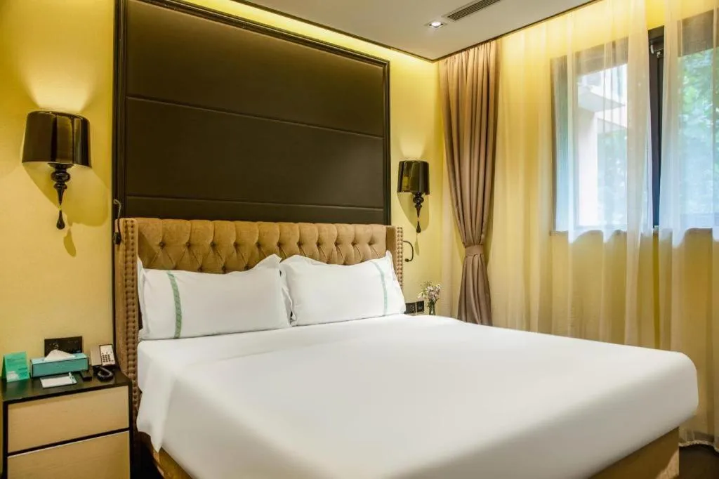 Bed in Xana Hotelle Beijing Olympic Park South Lishuiqiao Metro Station