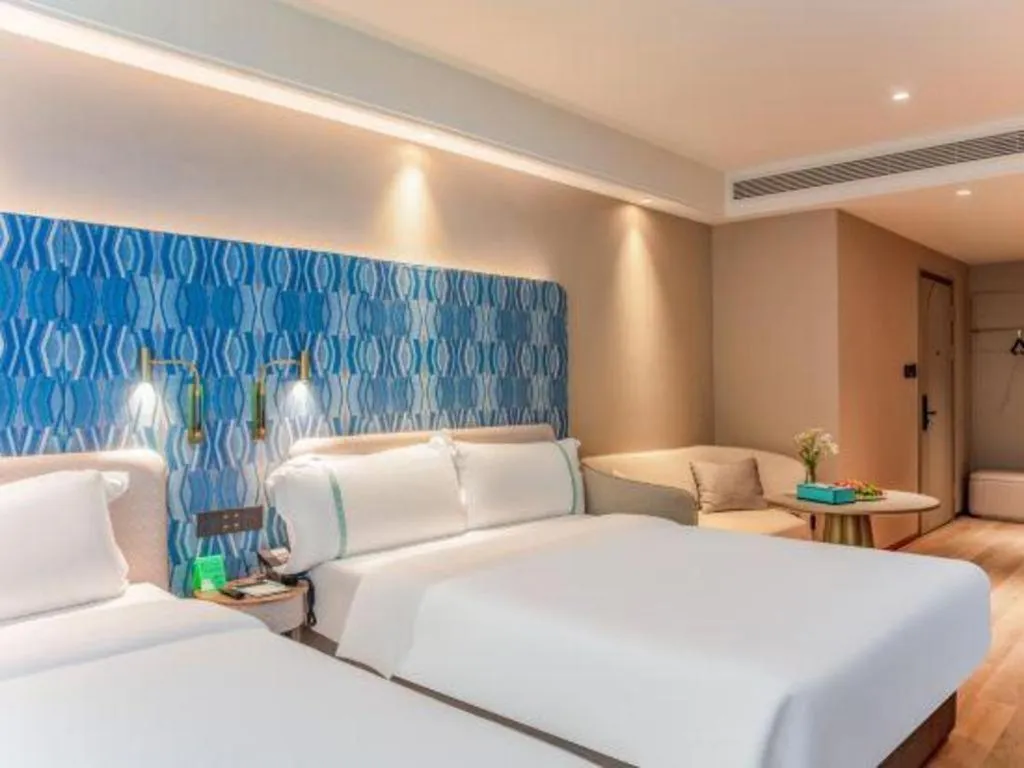 Bed in Xana Hotelle Beijing Olympic Park South Lishuiqiao Metro Station