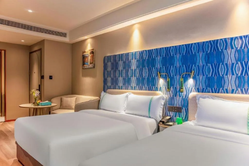 Bed in Xana Hotelle Beijing Olympic Park South Lishuiqiao Metro Station