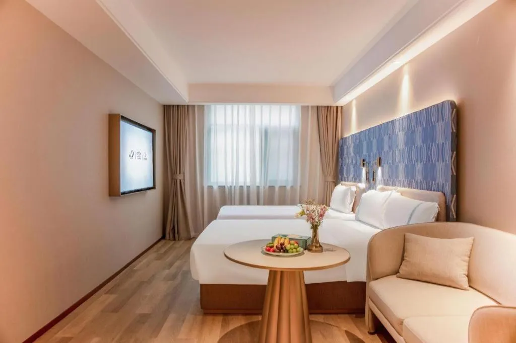 Bed in Xana Hotelle Beijing Olympic Park South Lishuiqiao Metro Station