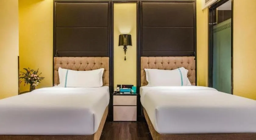 Bed in Xana Hotelle Beijing Olympic Park South Lishuiqiao Metro Station