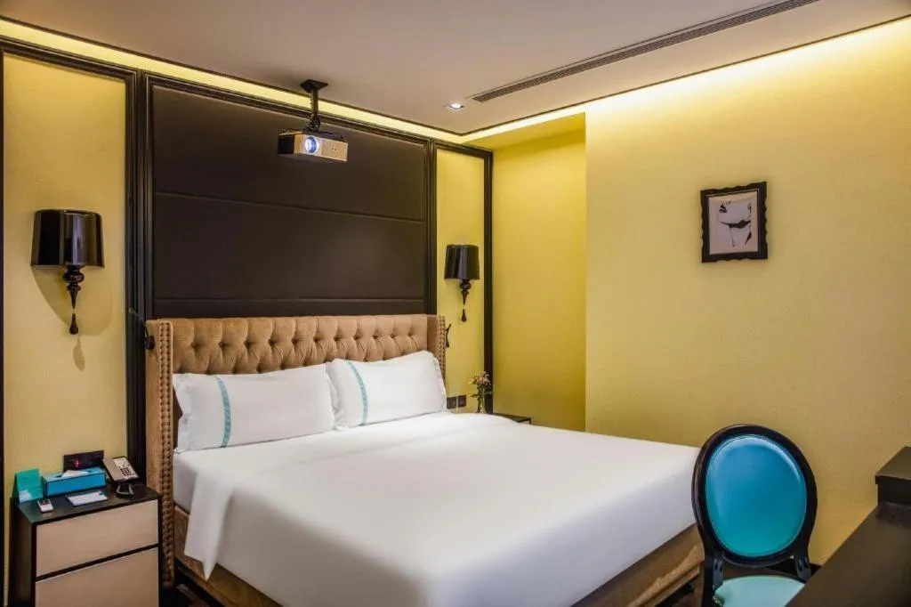 Bed in Xana Hotelle Beijing Olympic Park South Lishuiqiao Metro Station