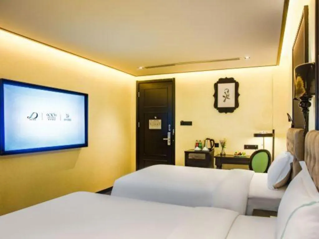 Bed in Xana Hotelle Beijing Olympic Park South Lishuiqiao Metro Station