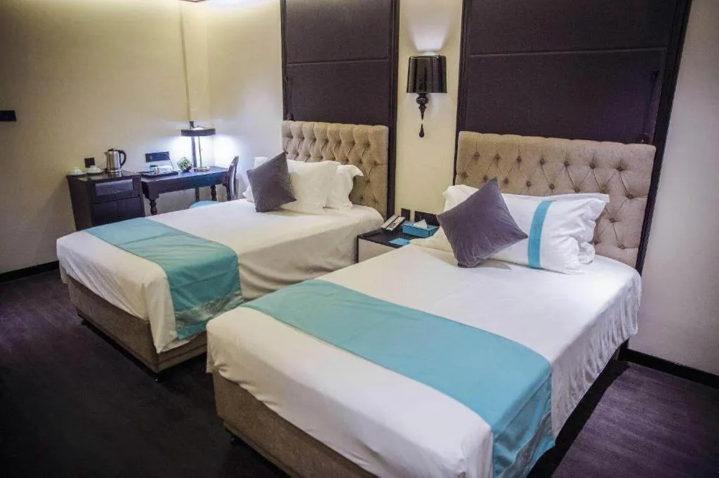 Bed in Xana Hotelle Beijing Olympic Park South Lishuiqiao Metro Station