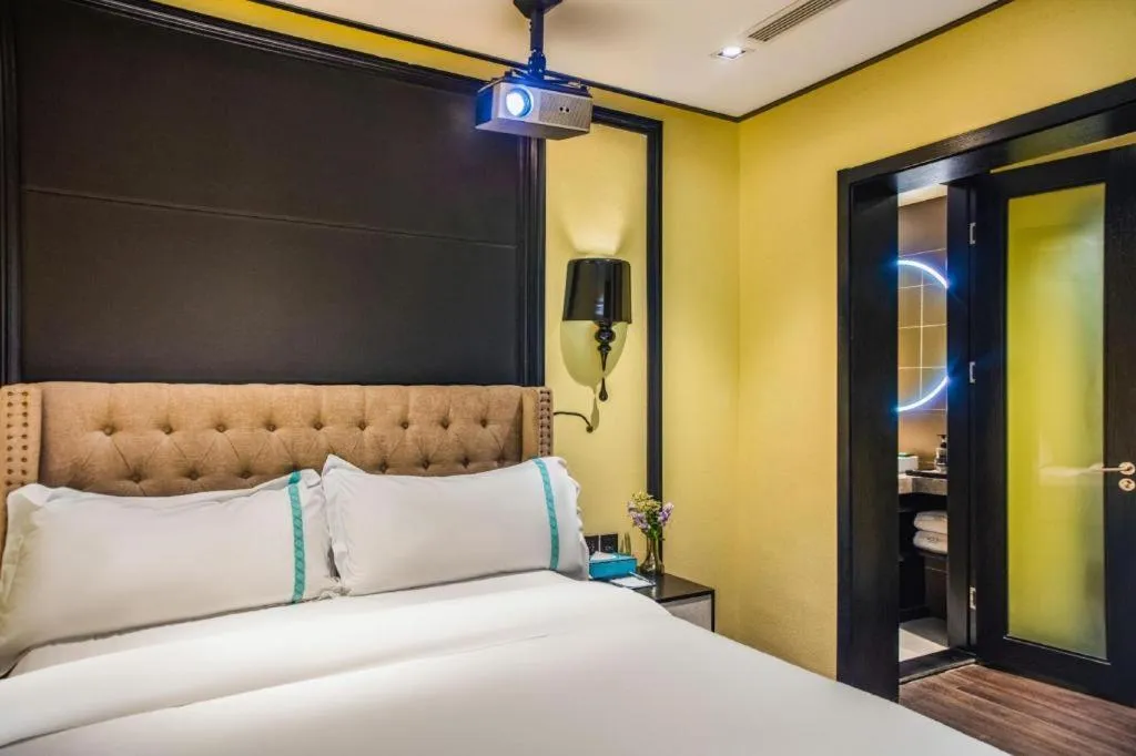 Bed in Xana Hotelle Beijing Olympic Park South Lishuiqiao Metro Station