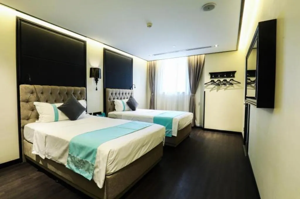 Bed in Xana Hotelle Beijing Olympic Park South Lishuiqiao Metro Station