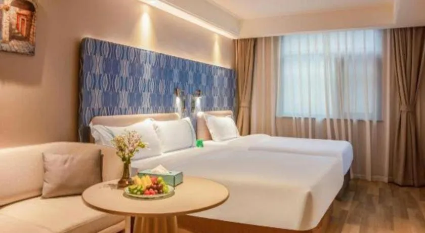 Bed in Xana Hotelle Beijing Olympic Park South Lishuiqiao Metro Station