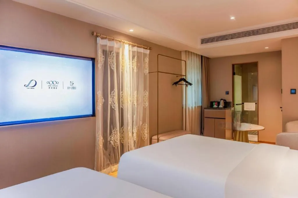 Bed in Xana Hotelle Beijing Olympic Park South Lishuiqiao Metro Station