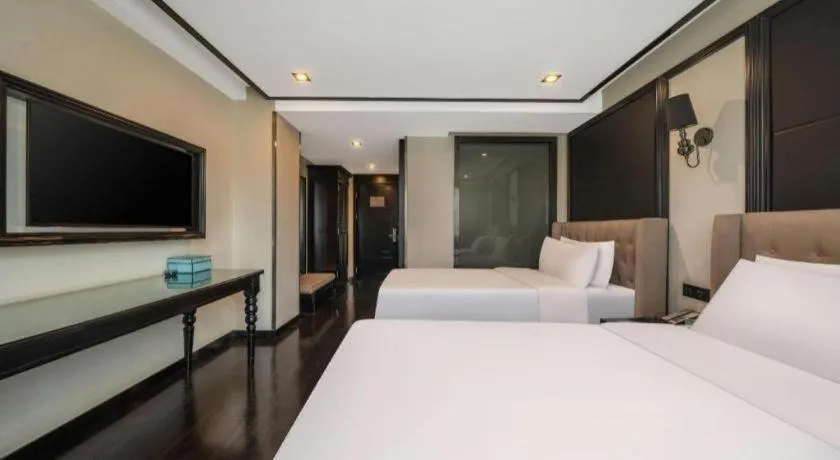 Bed in Xana Hotelle Xiamen Airport Zone Government