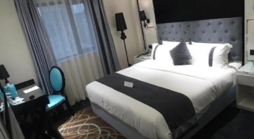 Bed in Xana Hotelle Neijiang City Center Branch