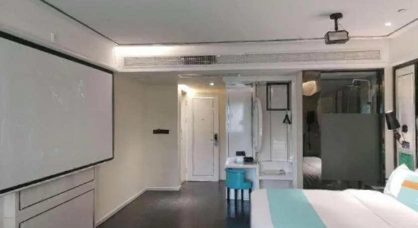 Bed in Xana Hotelle Neijiang City Center Branch