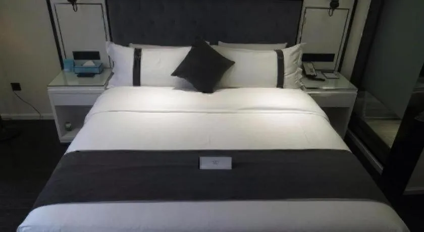 Bed in Xana Hotelle Neijiang City Center Branch