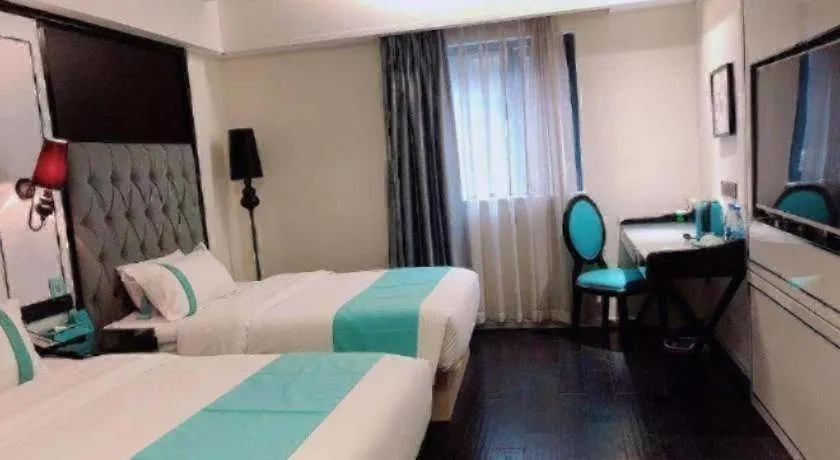 Bed in Xana Hotelle Neijiang City Center Branch