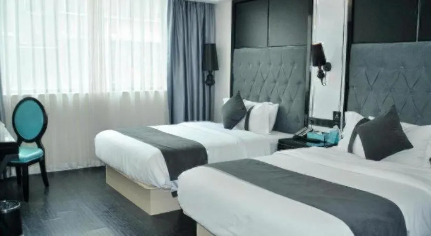 Bed in Xana Hotelle Neijiang City Center Branch