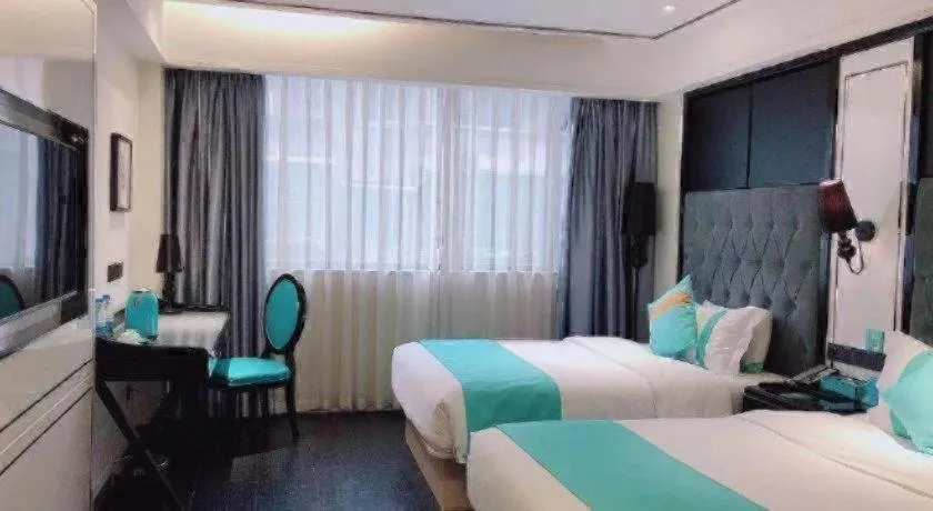 Bed in Xana Hotelle Neijiang City Center Branch
