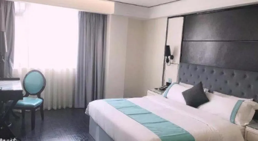 Bed in Xana Hotelle Neijiang City Center Branch