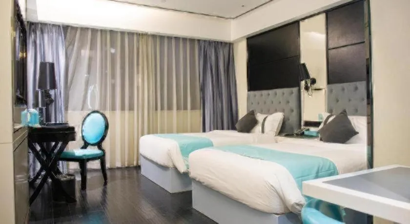 Bed in Xana Hotelle Neijiang City Center Branch