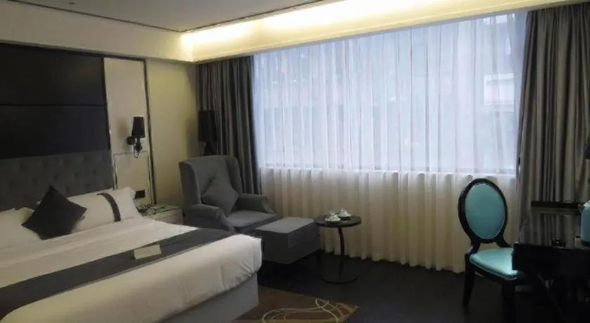 Bed in Xana Hotelle Neijiang City Center Branch