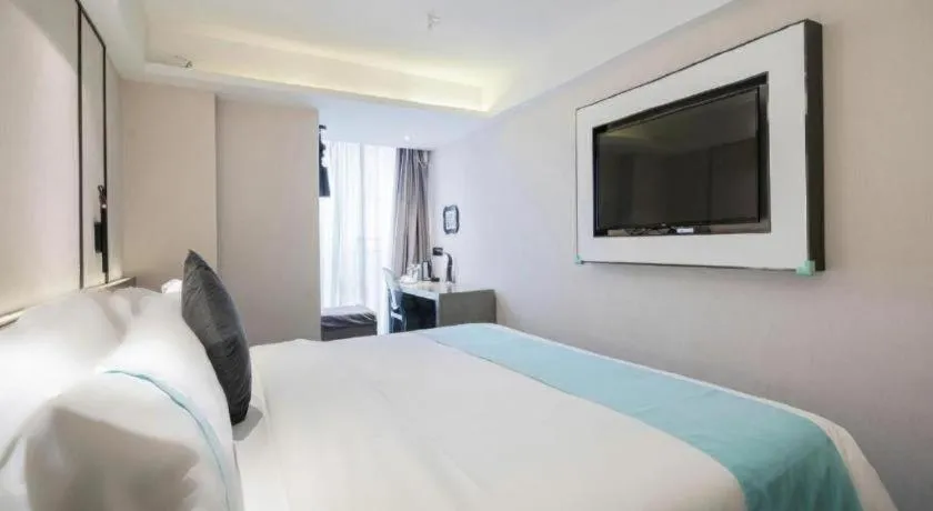 Bed in Xana Lite Guiyang Huaguoyuan Shuangzi Towers