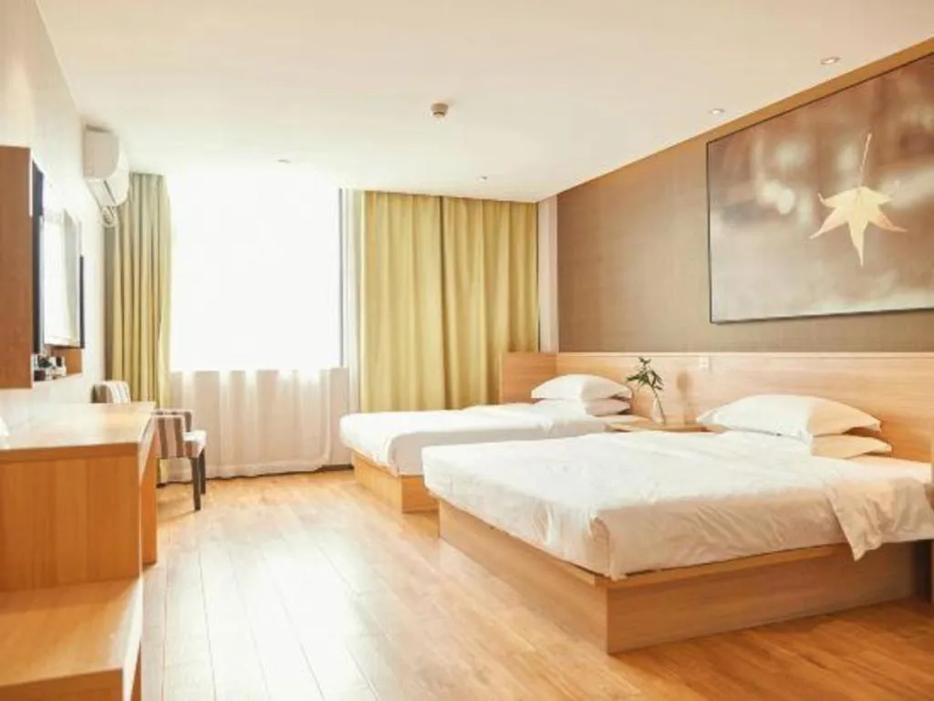 Bed in IU Hotel Chengdu Jianyang Xiongzhou Plaza