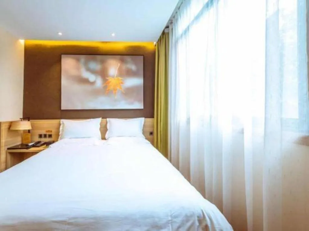 Bed in IU Hotel Chongqing Jiangbei International Airport