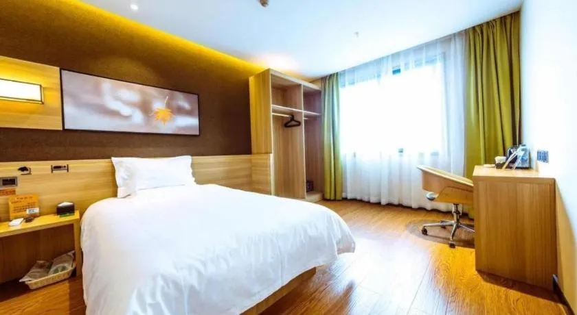 Bed in IU Hotel Chongqing Jiangbei International Airport