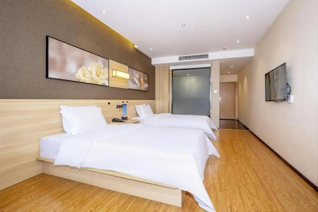 Bed in IU Hotel Chongqing Jiangbei International Airport