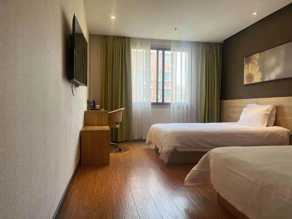 Bed in IU Hotel Chongqing Jiangbei International Airport