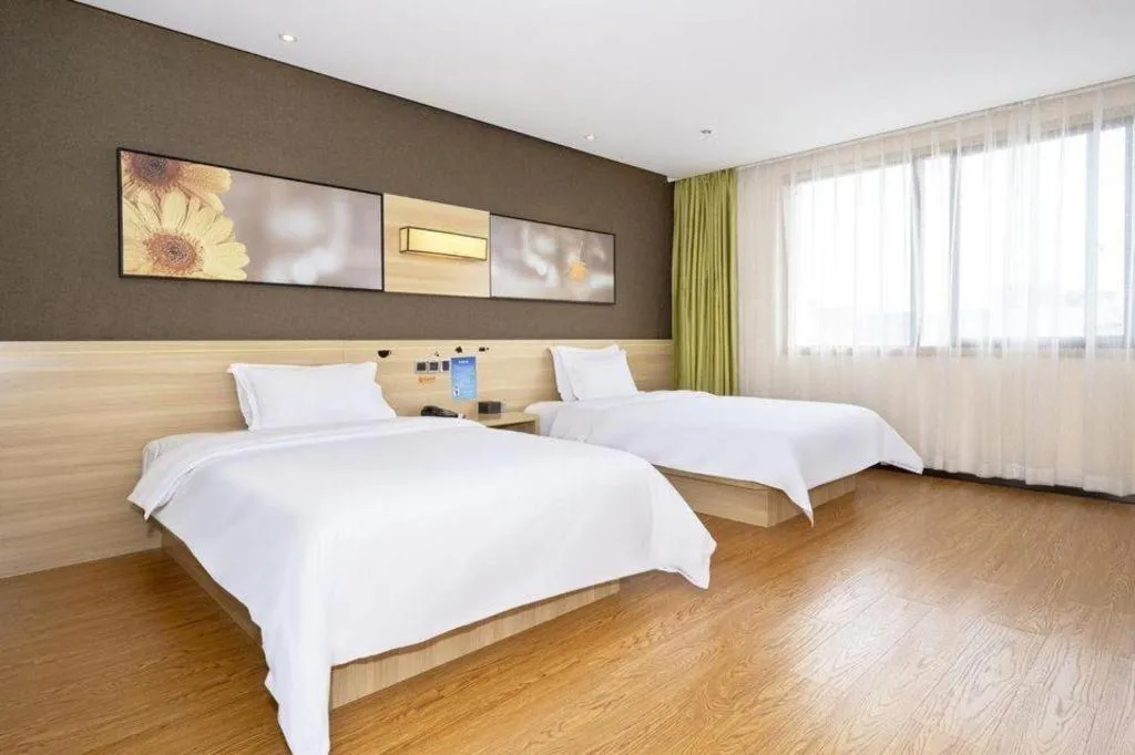Bed in IU Hotel Chongqing Jiangbei International Airport