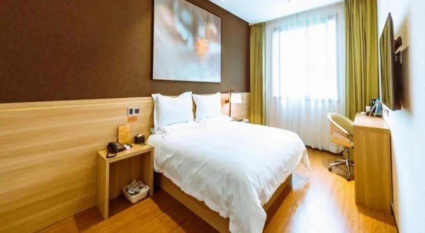 Bed in IU Hotel Chongqing Jiangbei International Airport