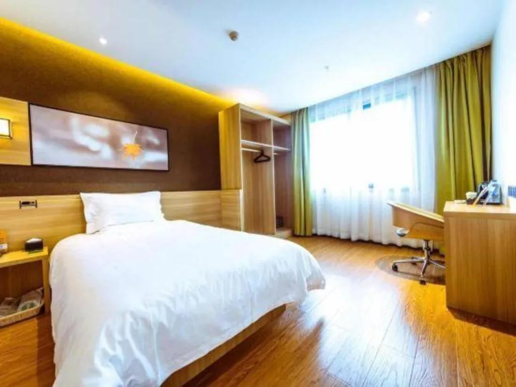 Bed in IU Hotel Chongqing Jiangbei International Airport