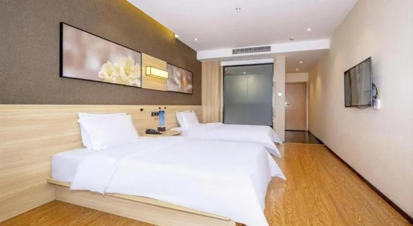 Bed in IU Hotel Chongqing Jiangbei International Airport