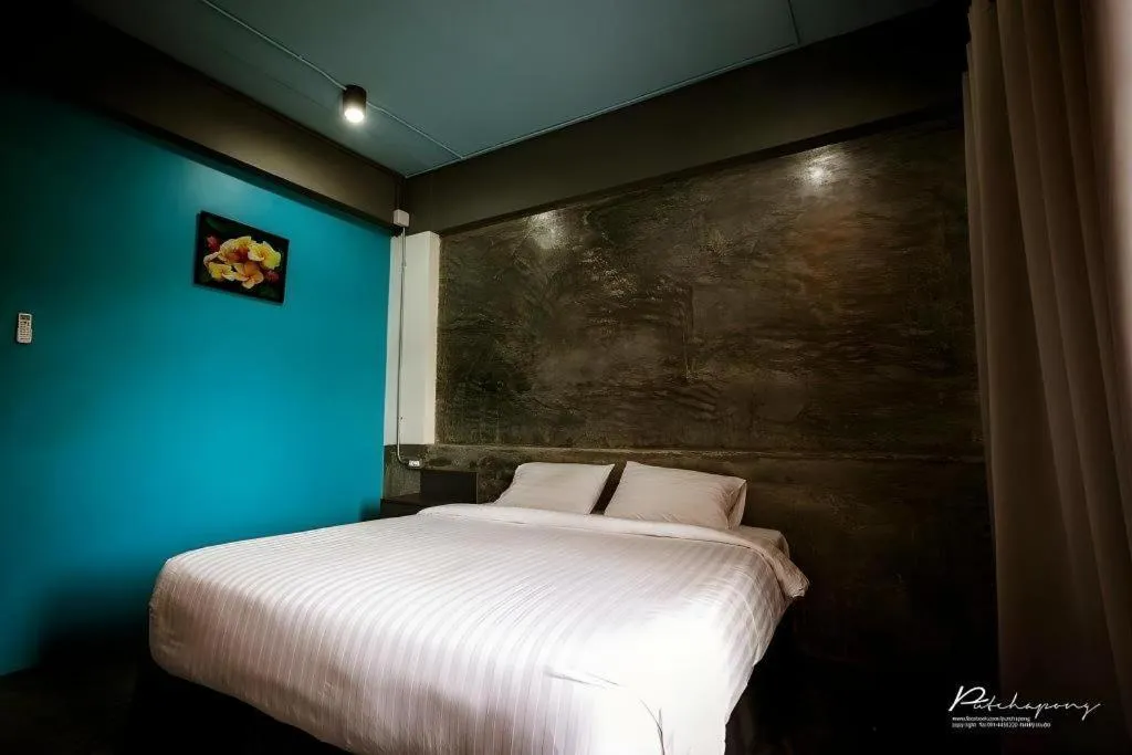 Bed in Pornsiri Hotel Sisaket