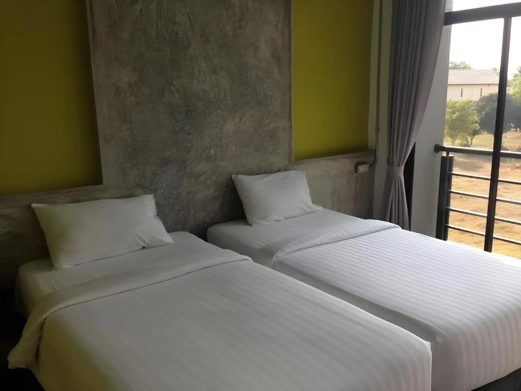 Bed in Pornsiri Hotel Sisaket