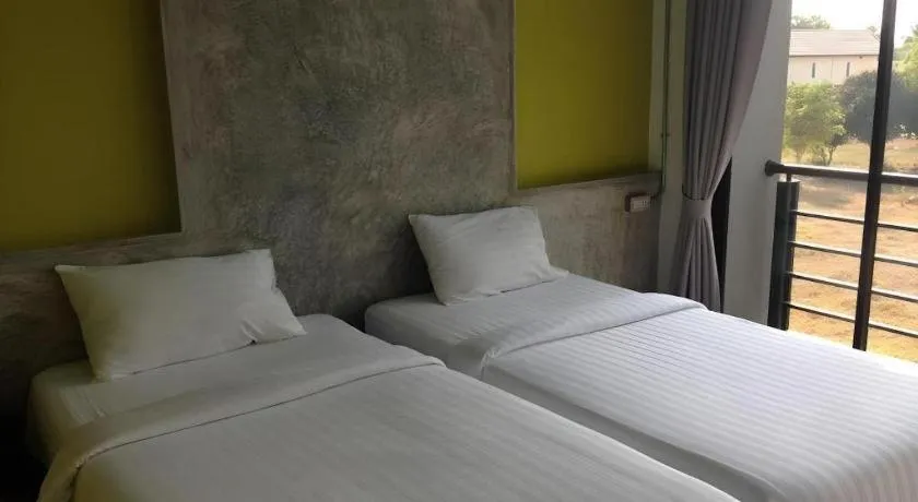 Bed in Pornsiri Hotel Sisaket