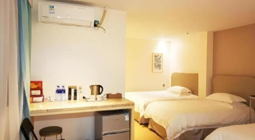 Bed in Leisurely Hotel Shenzhen