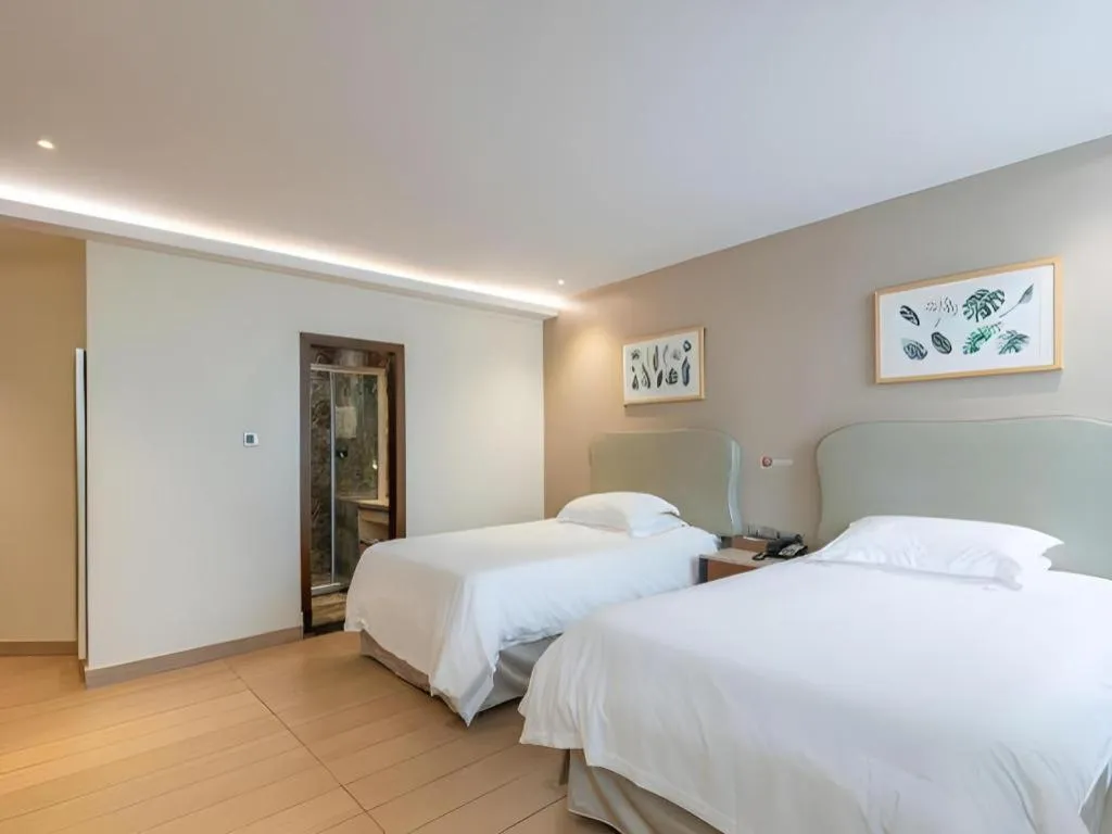 Bed in Leisurely Hotel Shenzhen