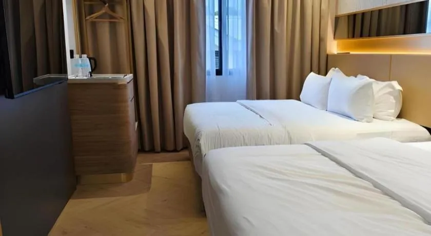 Bed in Grand City Hotel