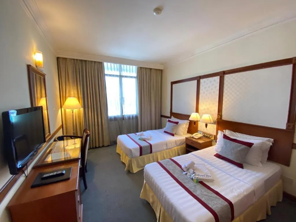 Bed in Grand City Hotel