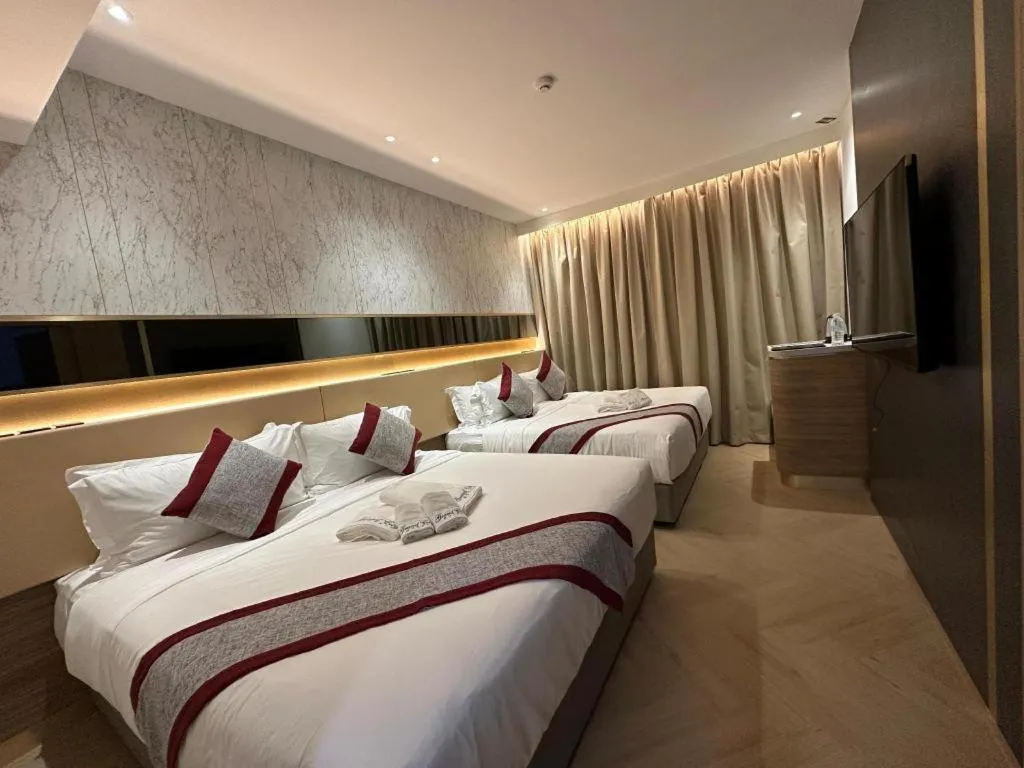 Bed in Grand City Hotel