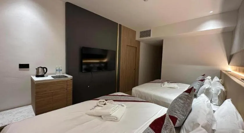 Bed in Grand City Hotel