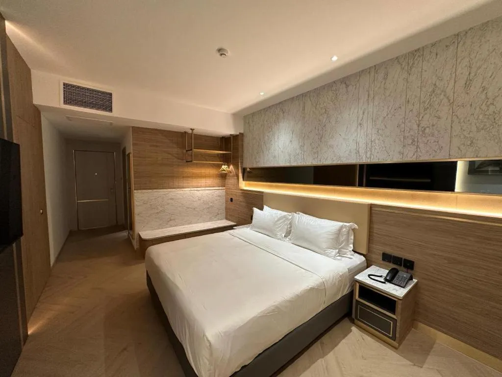 Bed in Grand City Hotel