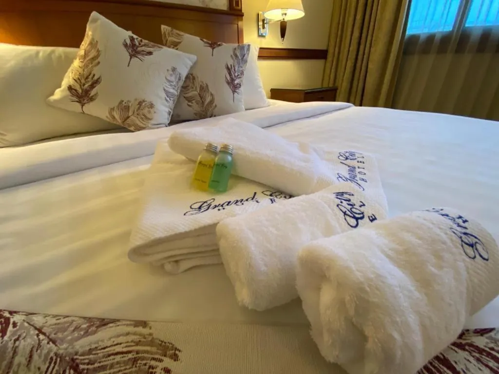 Bed in Grand City Hotel